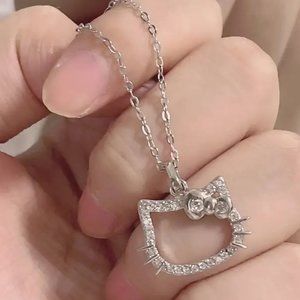 4/20 Sanrio Silver Tone Hello Kitty Rhinestone Accent Pendant